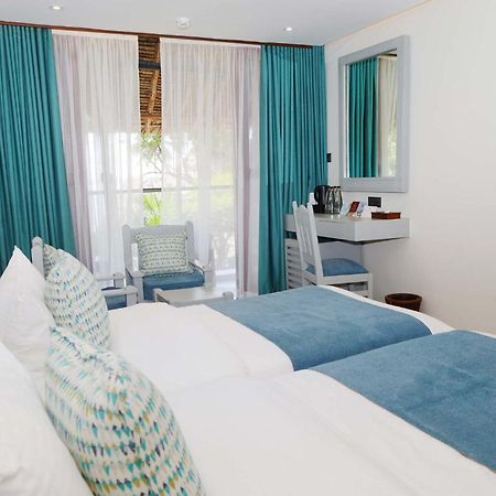 Baobab Beach Resort & Spa Diani Beach Esterno foto