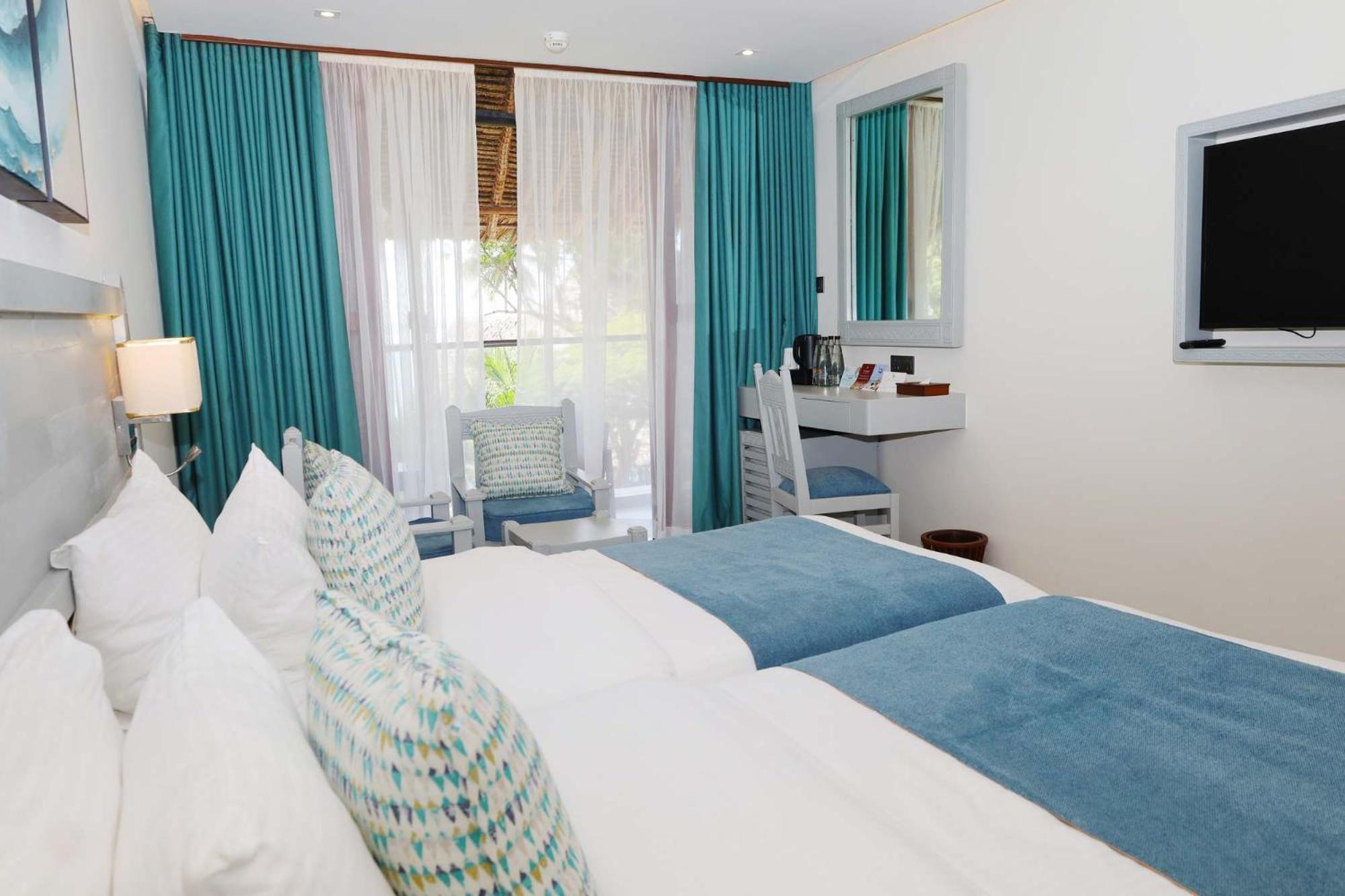Baobab Beach Resort & Spa Diani Beach Esterno foto